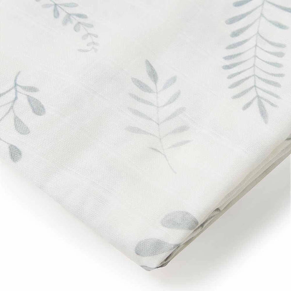 Fitted sheet with subtle leaf pattern on a white background